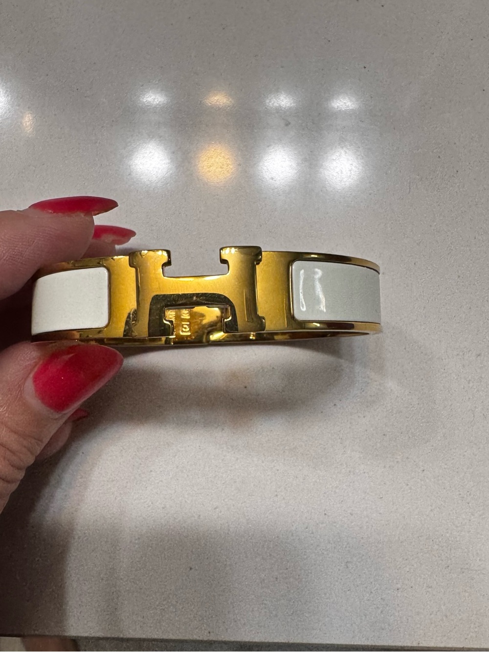 Gold Tone & White Enamel H Hinged Bangle Bracelet
